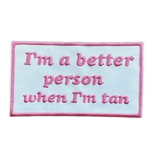 Hovedbilde "I'm a better person when I'm tan"   Tekst patch